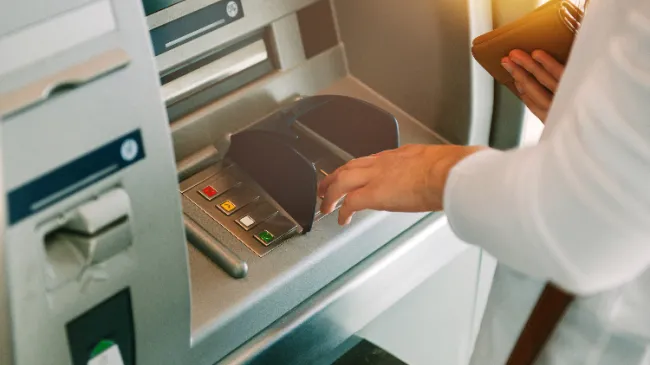 man at atm